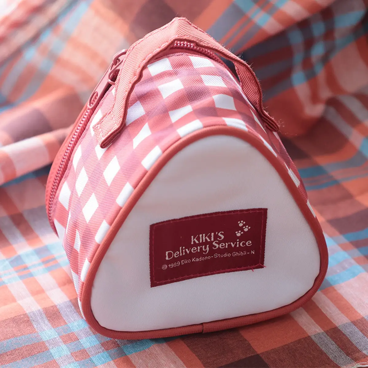 Studio Ghibli Launches Whimsical Kiki’s Delivery Service Picnic Line, Headlined by an Onigiri-Shaped Lunch Bag